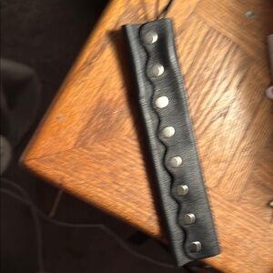 Sleek Black and Silver Belt with Classic Design